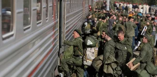 The autumn mobilisation in Russia in 2026: illusions and reality Russian soldiers board a train during the mobilisation in Russia.