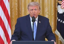 Trump has threatened the EU with tariffs over fines imposed on US tech companies Donald Trump and US flags