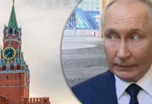 Володимир Путін на тлі Кремля після повідомлень про таємні переговори щодо війни.