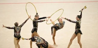 Croatia has banned Russian and Belarusian symbols at the gymnastics championships The gymnasts are performing a group routine with hoops