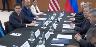 Marco Rubio and Sergey Lavrov, accompanied by their delegations, at the negotiating table in Manila