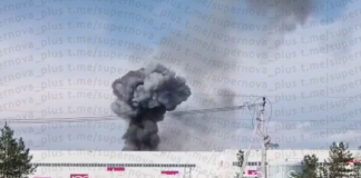 Thick black smoke rises above the Wildberries logistics complex in Sarapul following a drone attack