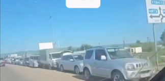 Queues at a petrol station in Russia during the fuel crisis.