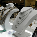 An Odessa jeweller is to stand trial for selling counterfeit jewellery under the guise of international brands