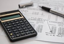 Zelenskyy has established a Day of Finance Professionals in Ukraine A calculator and financial documents on the desk