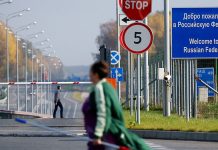 Russia is urgently closing its borders to its own citizens A border crossing point in Russia where Russians go through immigration using their foreign passports.