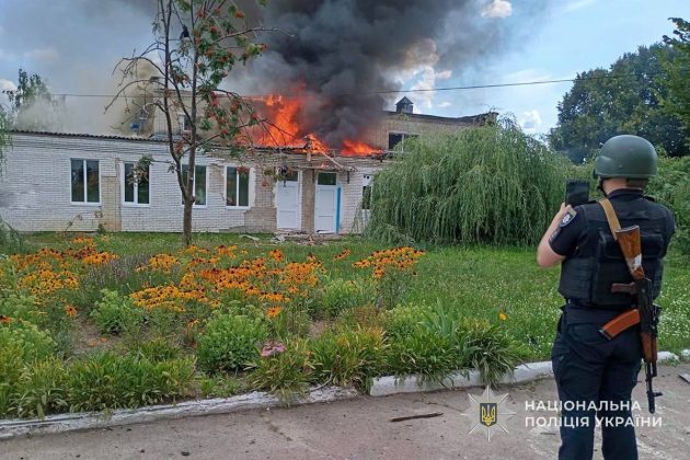 A building is on fire following an attack by the Russian Federation