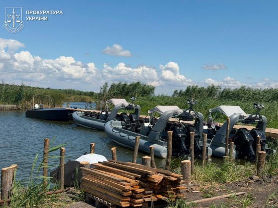 Boats and building materials on the premises of a private property in the Odesa region