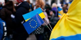 The EU has extended temporary protection for Ukrainians until 4 March 2028 The flags of the European Union and Ukraine
