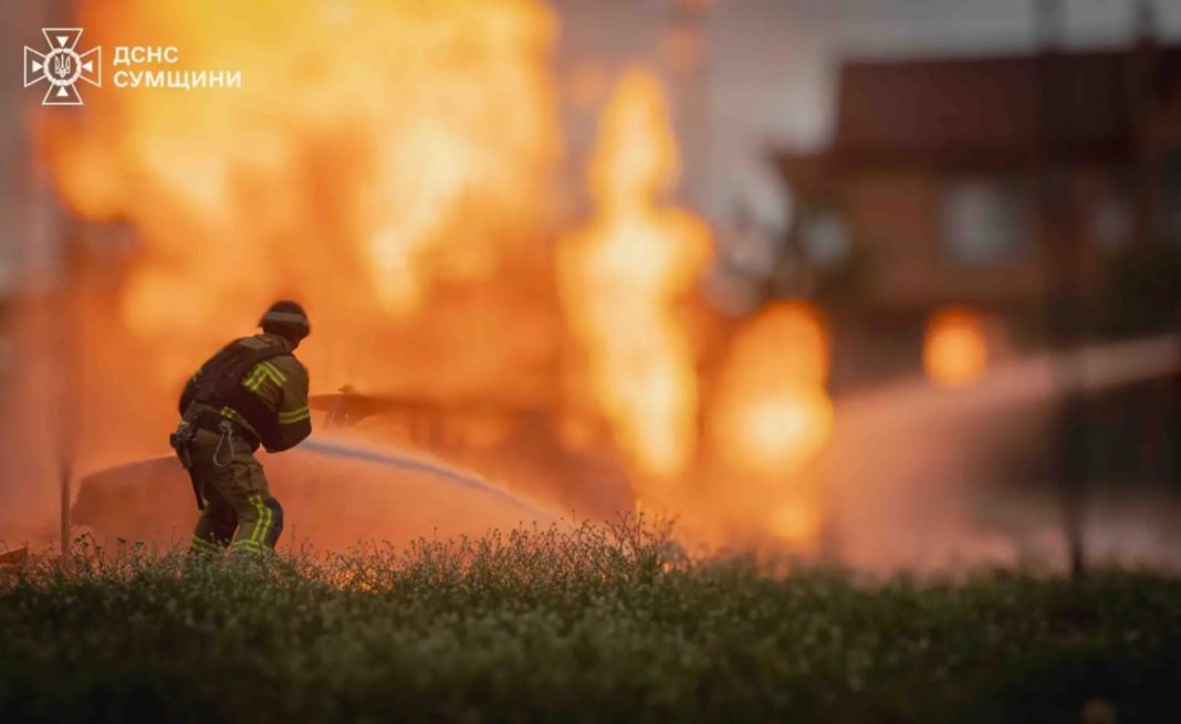 Sumy petrol station 1 A firefighter puts out a fire at a petrol station following a Russian attack on Sumy