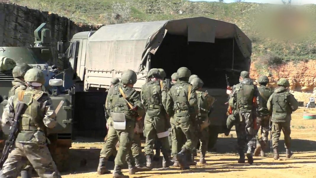 Russian military personnel on exercises Russian military personnel during exercises at the training ground