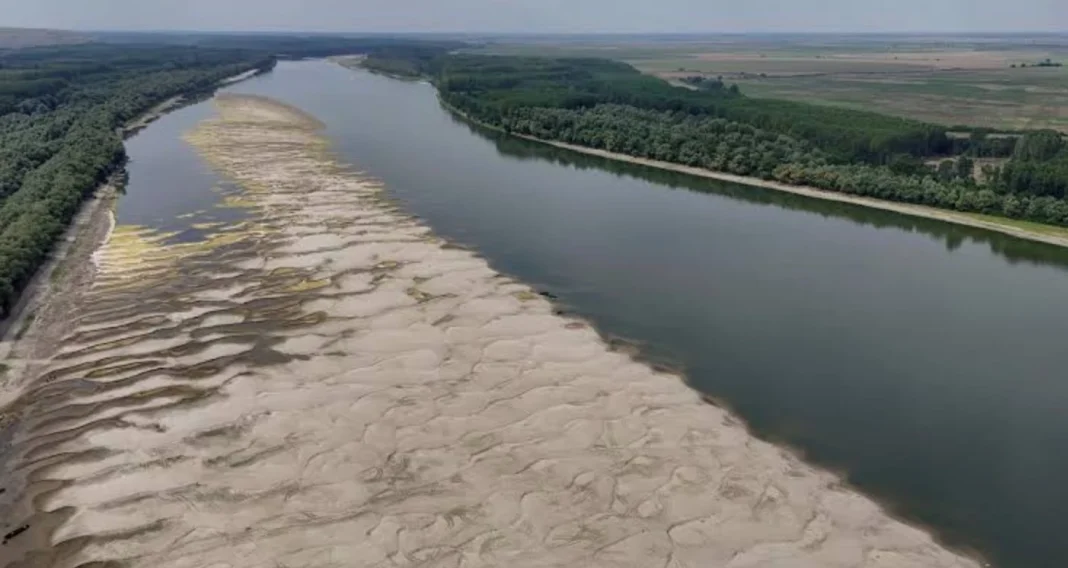 A shallow river against a backdrop of dry weather in western Ukraine