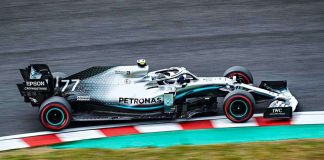 The FIA has reinstated national colours for Russian and Belarusian drivers A Formula 1 car on the race track