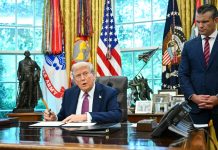 The US has imposed tariffs of up to 100% on imports of drones and components Donald Trump signs documents