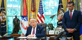The US has imposed tariffs of up to 100% on imports of drones and components Donald Trump signs documents