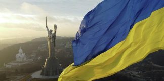 The Ukrainian flag flying above the Motherland Monument in Kyiv