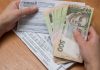 Українці масово перестають платити за комуналку Платіжки за житлово-комунальні послуги
