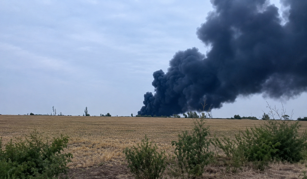 Smoke rising from the site of a fire at a warehouse in the Mykolaiv district following a Russian attack Thick black smoke rises above the scene of a fire at a warehouse in the Mykolaiv district following a Russian attack
