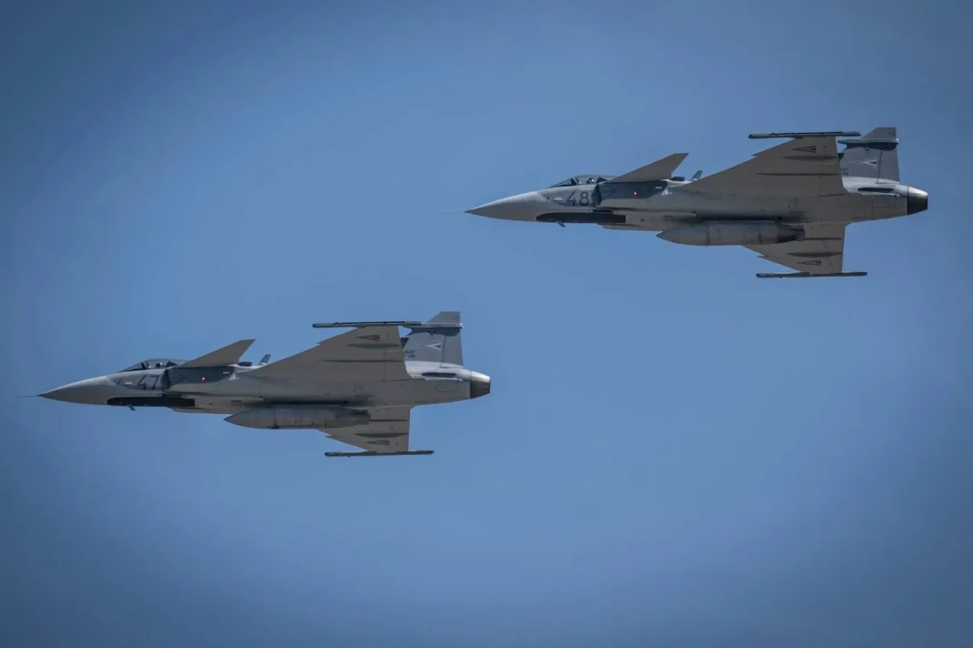 A Hungarian Gripen fighter jet in flight