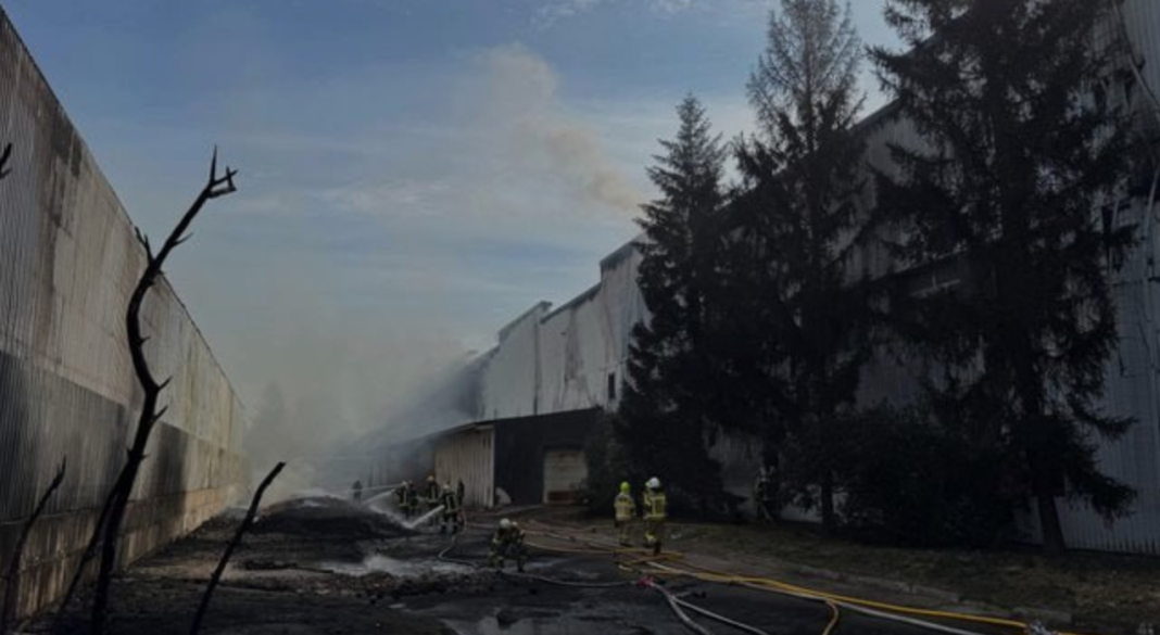 EVA Firefighters are putting out a fire at the EVA distribution centre in Brovary