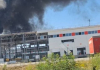 Russia attacked a «Nova Poshta» terminal in the Kharkiv region Thick black smoke over a Nova Poshta terminal in the Kharkiv region following a Russian strike