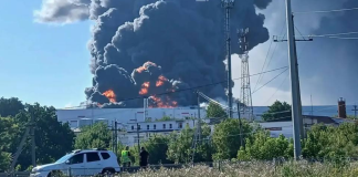 Thick black smoke above the Wildberries logistics hub in Novosemeykino