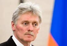 Дмитро Пєсков під час офіційного брифінгу