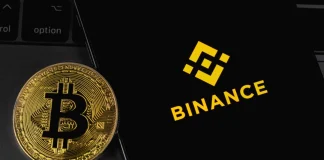 Логотип криптовалютної біржі Binance на екрані смартфона