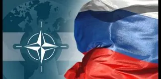 Росія може перевірити НАТО обмеженим вторгненням восени Прапори НАТО і РФ