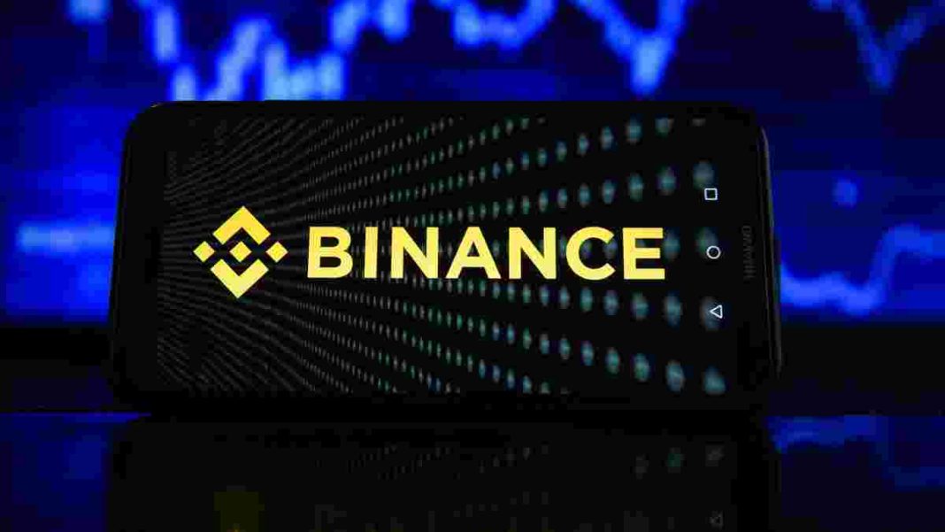 Логотип криптобіржі Binance Логотип криптобіржі Binance на темному тлі
