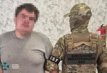 An SBU officer and a detainee