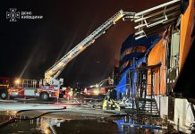 Rescue workers from the State Emergency Service are dealing with the aftermath of the attack in the Kyiv region