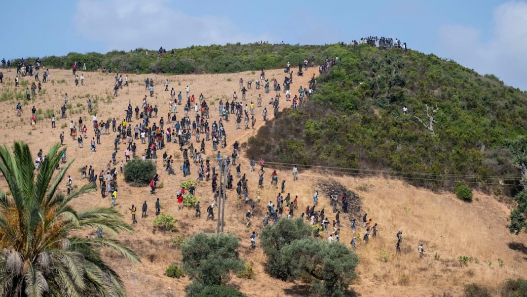 Migrants from Morocco Moroccan security forces are guarding the approaches to the border with the Spanish enclave of Ceuta