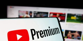 The YouTube logo on a smartphone screen