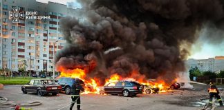 Rescue workers from the State Emergency Service are dealing with the aftermath of a drone attack in the Bucha district