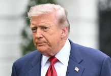 Donald Trump speaks to journalists