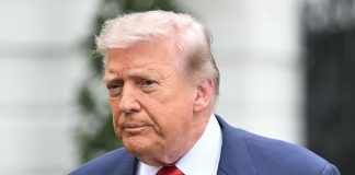 Donald Trump speaks to journalists