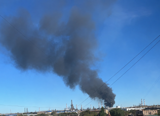 Smoke rising above the Orsk oil refinery following a drone attack