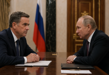 Vladimir Putin and CIA Director John Ratcliffe