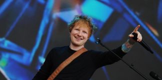Ed Sheeran apologised for the row with Macklemore and condemned the war in Gaza Ed Sheeran performs on stage during a concert
