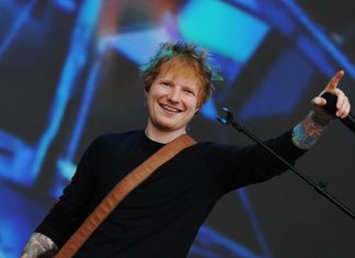 Ed Sheeran apologised for the row with Macklemore and condemned the war in Gaza Ed Sheeran performs on stage during a concert