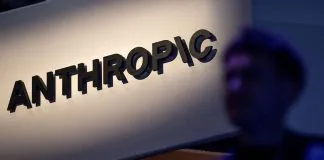 Anthropic попередила інвесторів про екзистенційні ризики ШІ Логотип Anthropic на екрані поруч із текстом про ризики штучного інтелекту