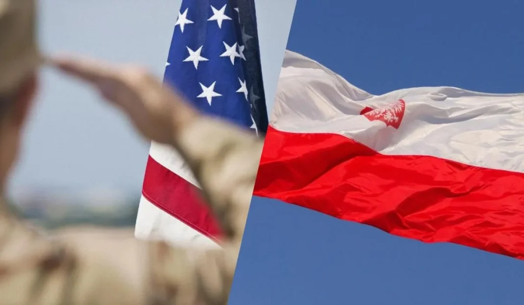 1200_0_1779049572-5186 Прапори США та Польщі на тлі американського військового