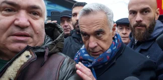 Kelina Georgescu is being questioned in connection with a fraud case involving over €1.1 million Kalin Georgescu, accompanied by police officers