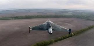 Shahid Siker with an automatic target acquisition system