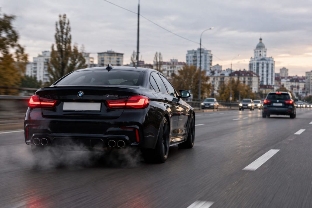 A car with a loud exhaust on the road