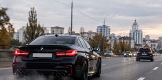 A car with a loud exhaust on the road