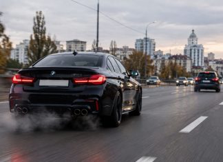 A car with a loud exhaust on the road