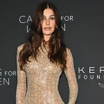 Camila Morrone chose a snake-print dress for the Kering evening event