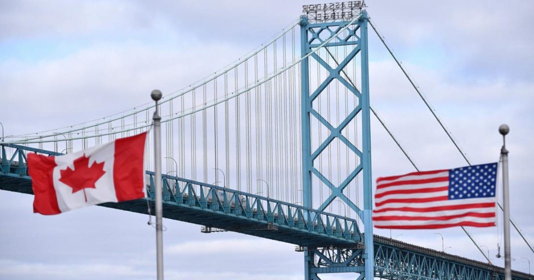 The flags of Canada and the US against the backdrop of the trade dispute